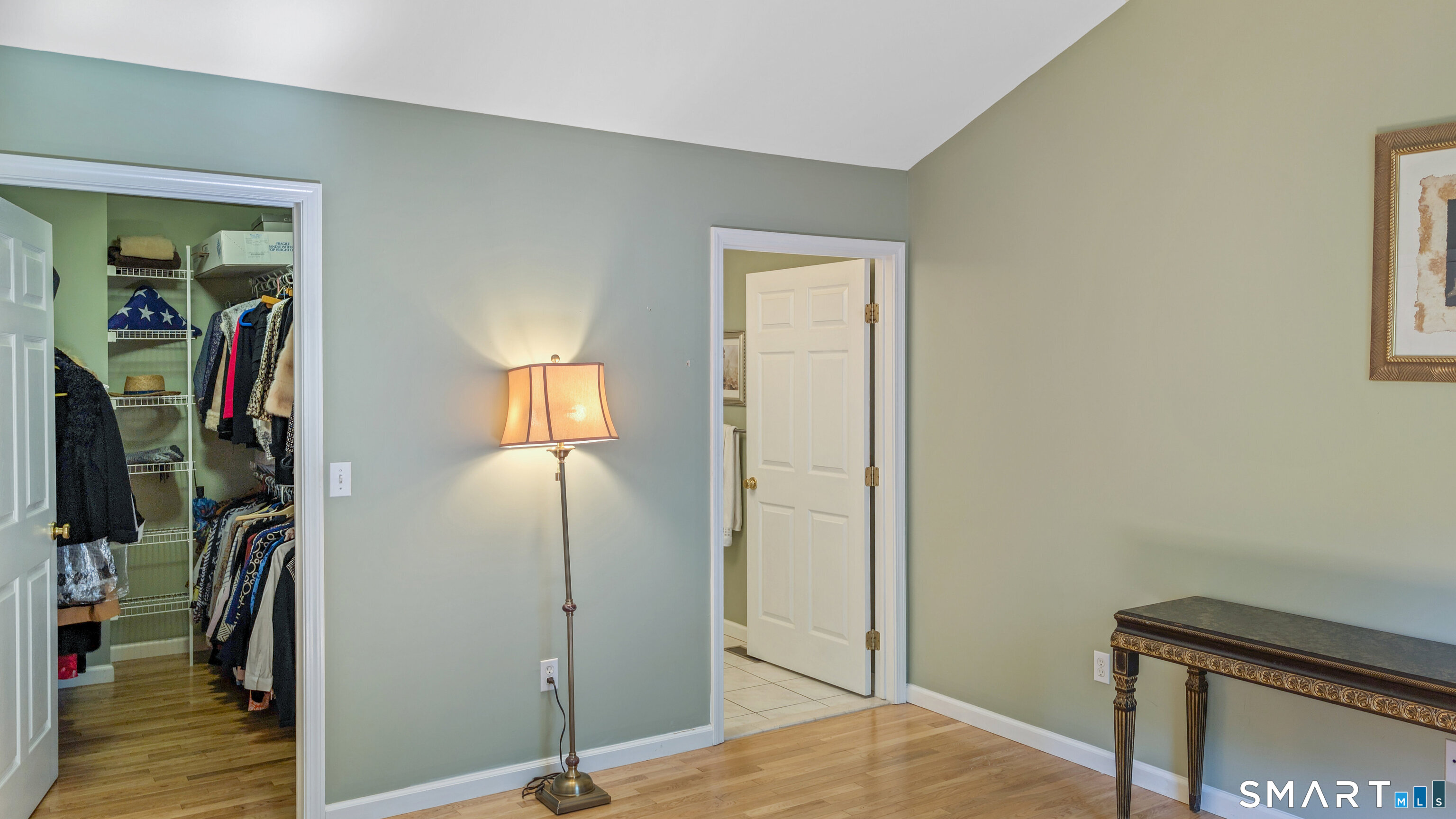 123 Louis Hill Road, Unit 123 Newtown, CT 06482 - Photo 26 of 35 a view of a bedroom with wooden floor