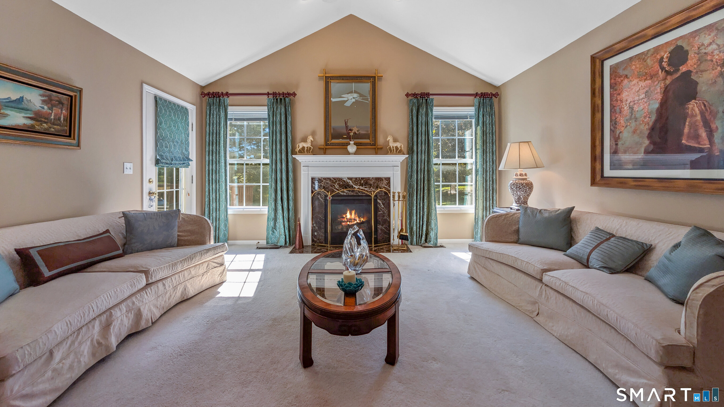 123 Louis Hill Road, Unit 123 Newtown, CT 06482 - Photo 3 of 35 a living room with furniture a window and a fireplace