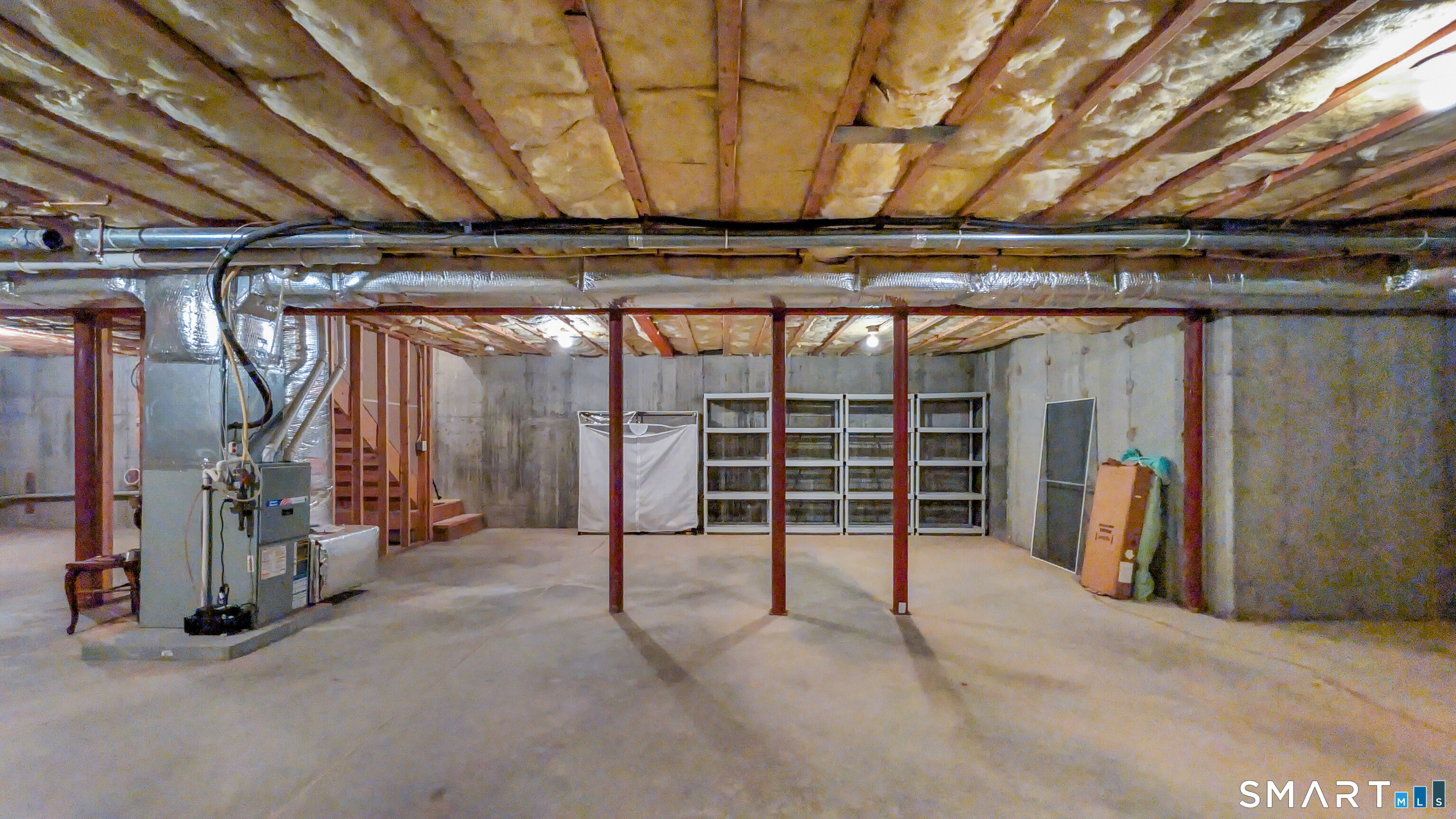 123 Louis Hill Road, Unit 123 Newtown, CT 06482 - Photo 31 of 35 a view of an empty room with wooden floor