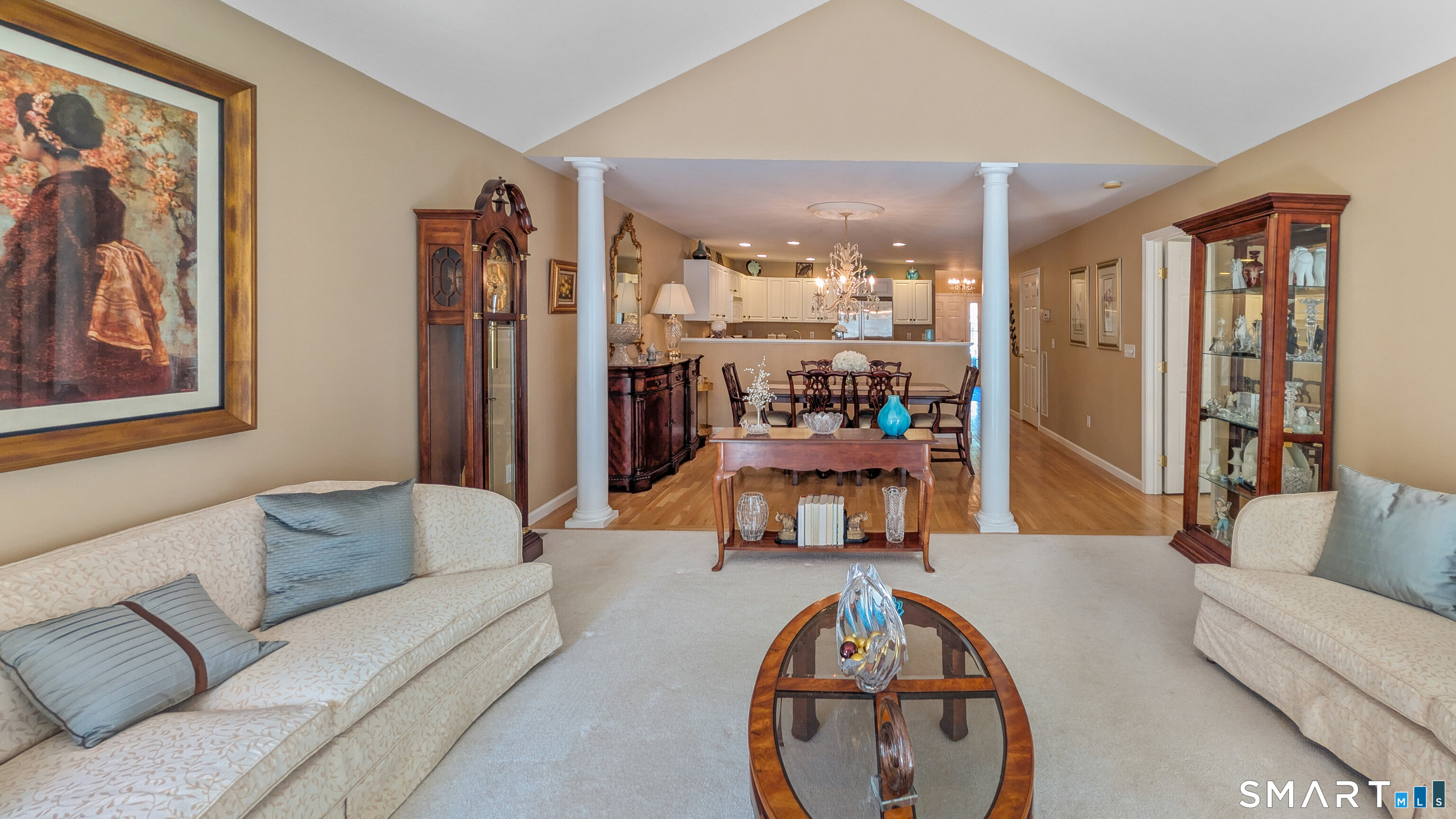 123 Louis Hill Road, Unit 123 Newtown, CT 06482 - Photo 6 of 35 a living room with furniture and a large window
