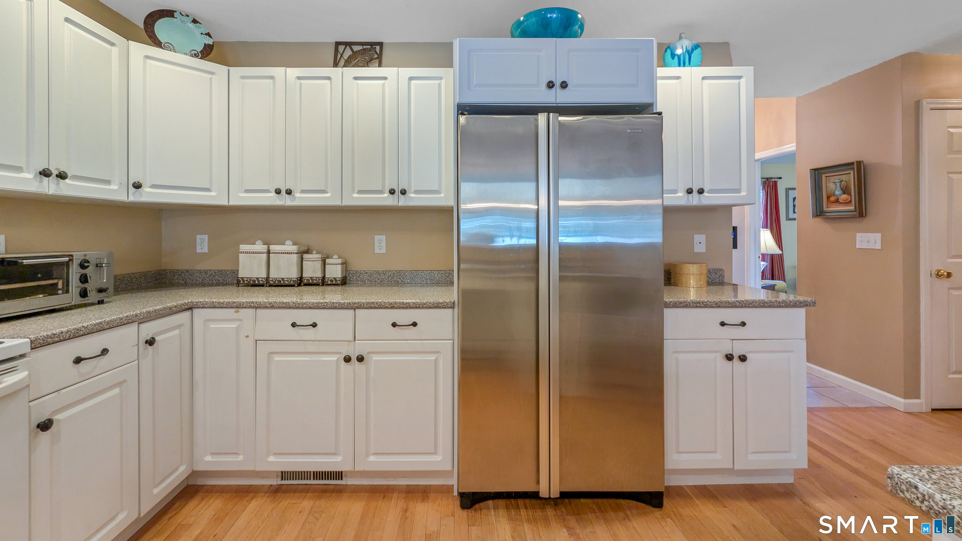 123 Louis Hill Road, Unit 123 Newtown, CT 06482 - Photo 10 of 35 a kitchen with cabinets and stainless steel appliances