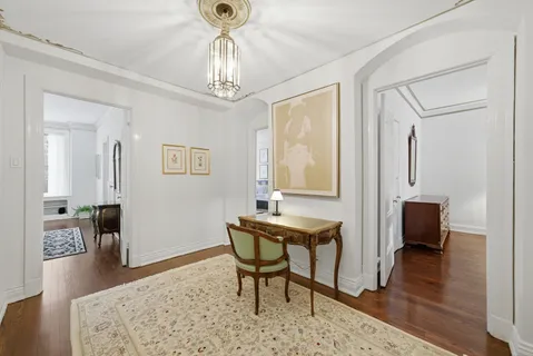 a view of a livingroom with furniture and wooden floor