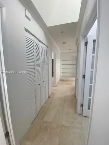 en empty room with windows