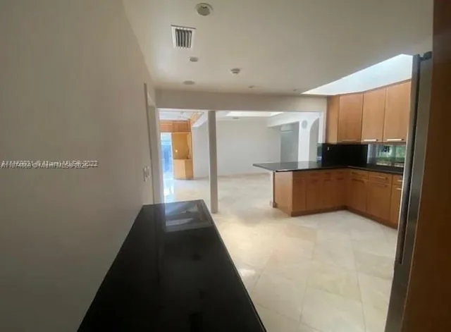 a view of staircase with white walls