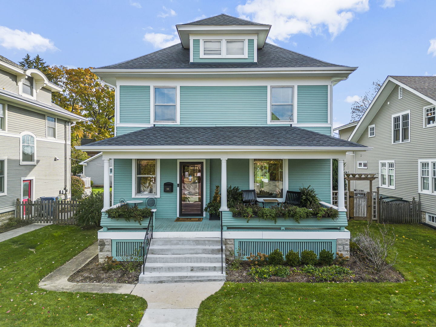 116 Columbia Street Naperville, IL 60540 - Photo 1 of 27 a front view of a house with a yard