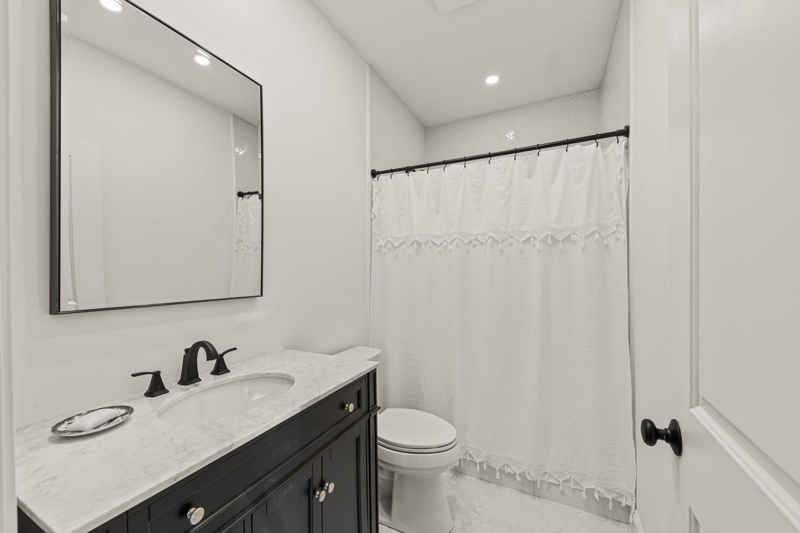116 Columbia Street Naperville, IL 60540 - Photo 16 of 27 a bathroom with a granite countertop sink toilet and shower