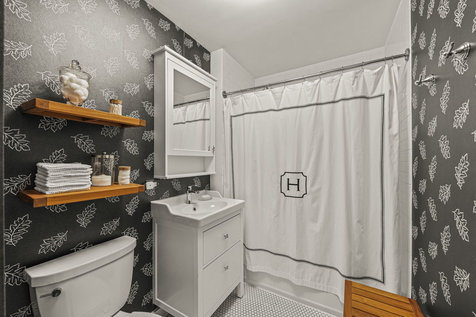 116 Columbia Street Naperville, IL 60540 - Photo 19 of 27 a bathroom with a sink a toilet and shower curtain