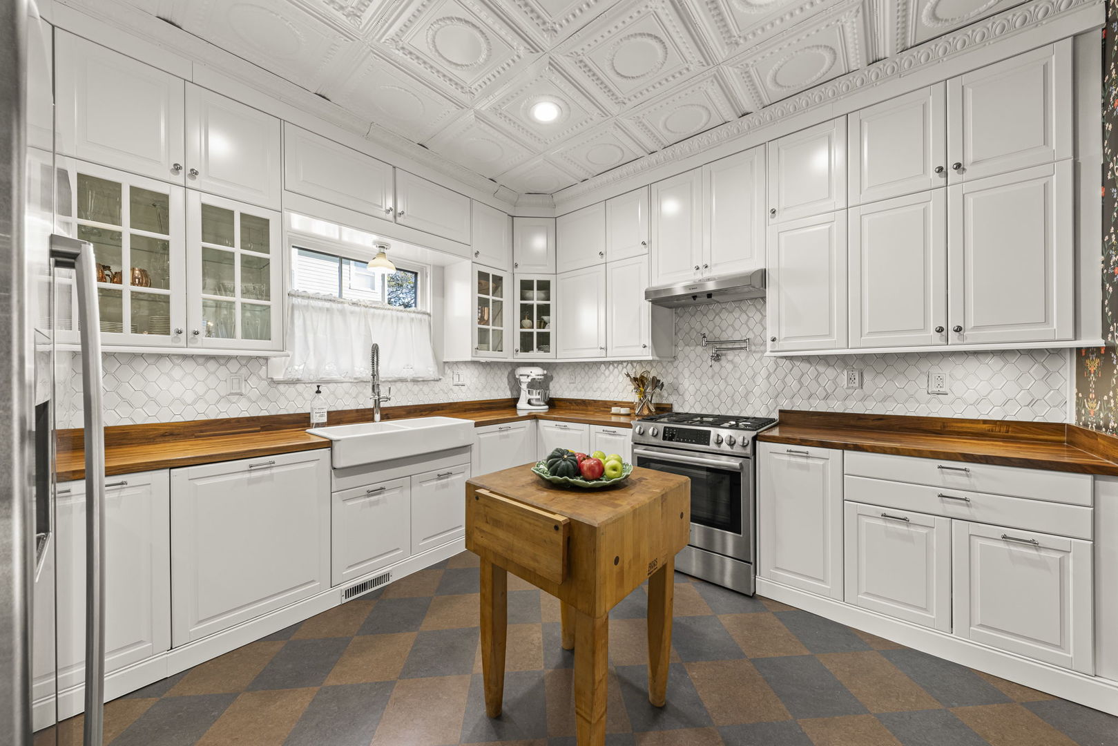 116 Columbia Street Naperville, IL 60540 - Photo 2 of 27 a kitchen with stainless steel appliances granite countertop a stove and white cabinets