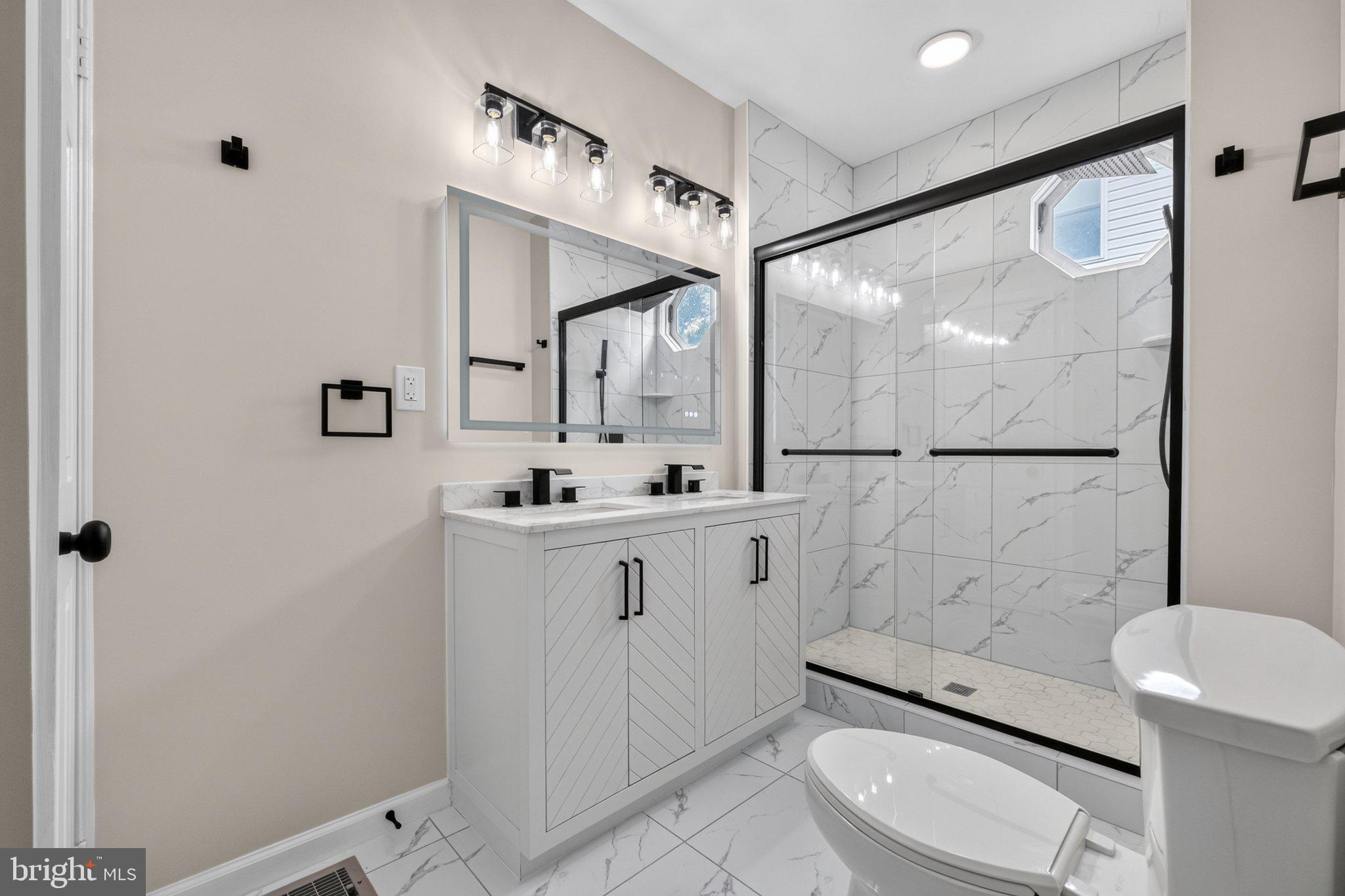 2317 Ruth Avenue Baltimore, MD 21219 - Photo 17 of 29 Beautiful master bathroom oasis.