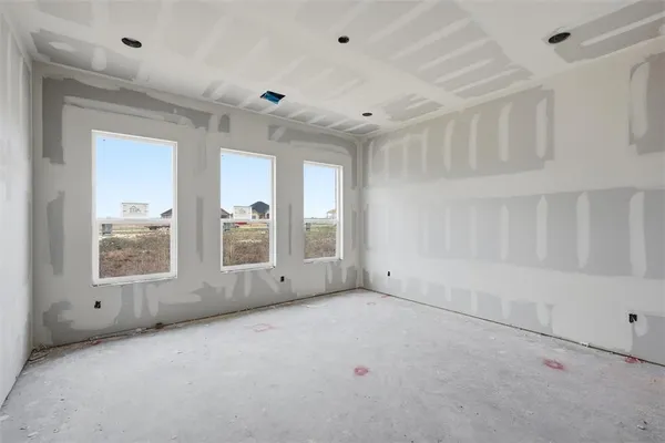 a view of a hallway with entryway and closet