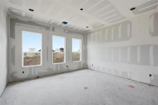 a view of a hallway with entryway and closet