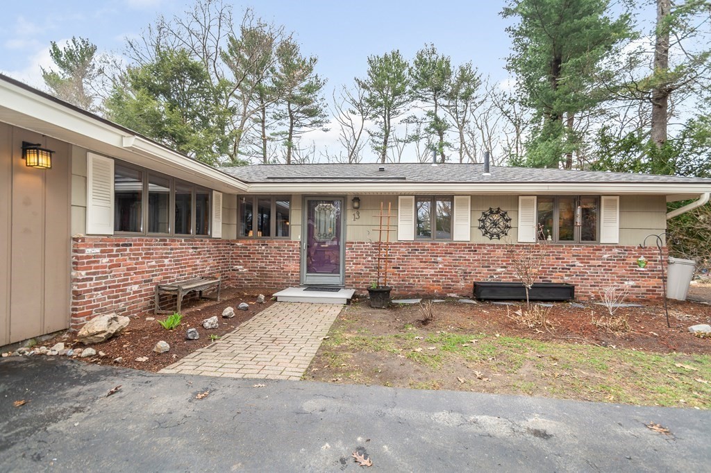 13 Ranch Road Chelmsford, MA 01824 - Photo 2 of 42 front view of a house with a yard
