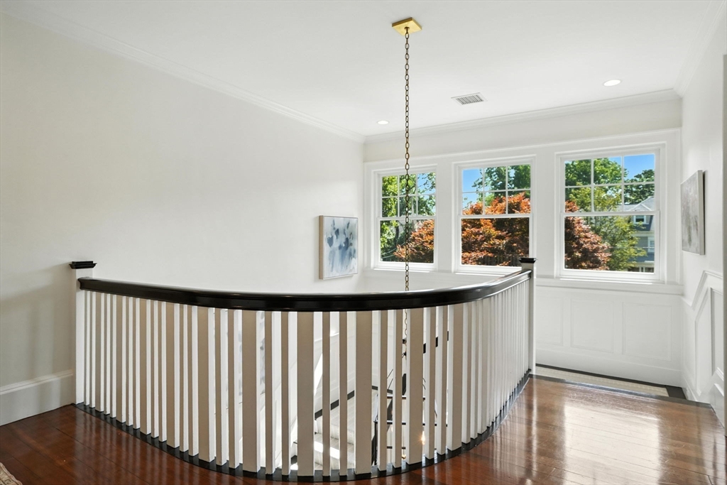 15 Winthrop Road Lexington, MA 02421 - Photo 22 of 39 a view of a wooden floor and a window