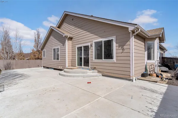 a front view of a house with a garage