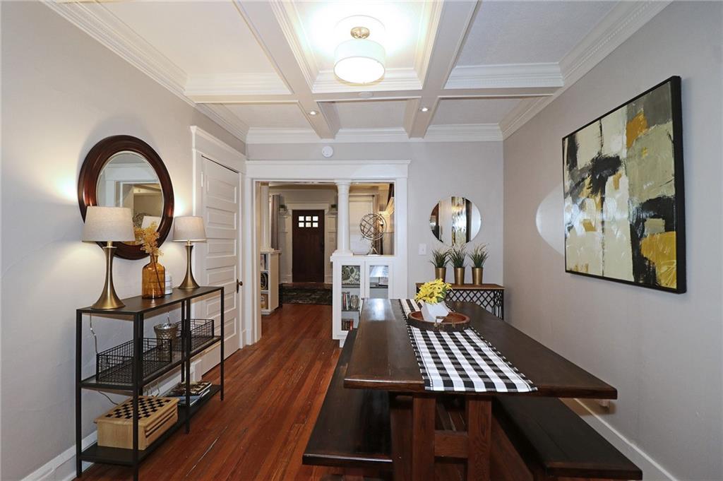 926 Waverly Way Northeast, Unit E Atlanta, GA 30307 - Photo 1 of 1 a view of a hallway with wooden floor and workspace