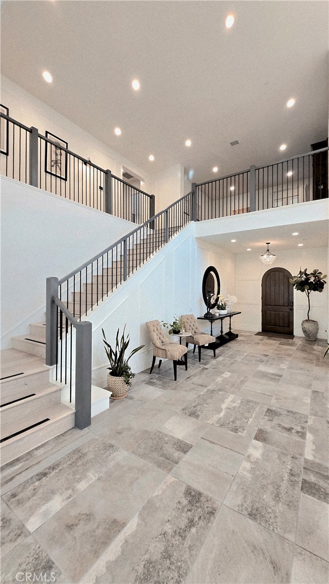 56 Redshift Irvine, CA 92618 - Photo 13 of 67 a view of a livingroom with furniture and stairs