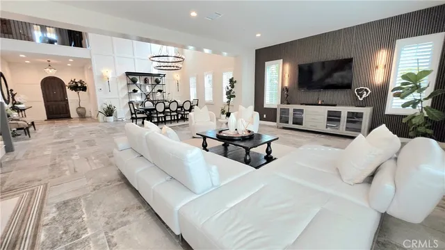 a kitchen with sink stove and refrigerator