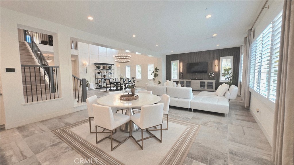 56 Redshift Irvine, CA 92618 - Photo 19 of 67 a living room with furniture and a flat screen tv