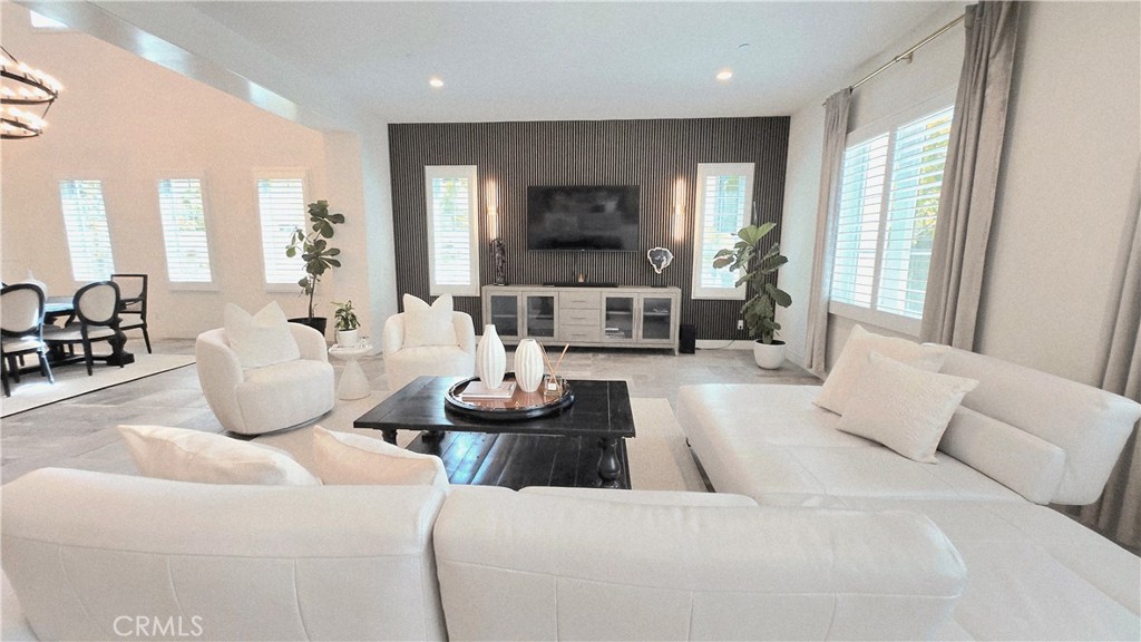56 Redshift Irvine, CA 92618 - Photo 20 of 67 a living room with furniture and a large window