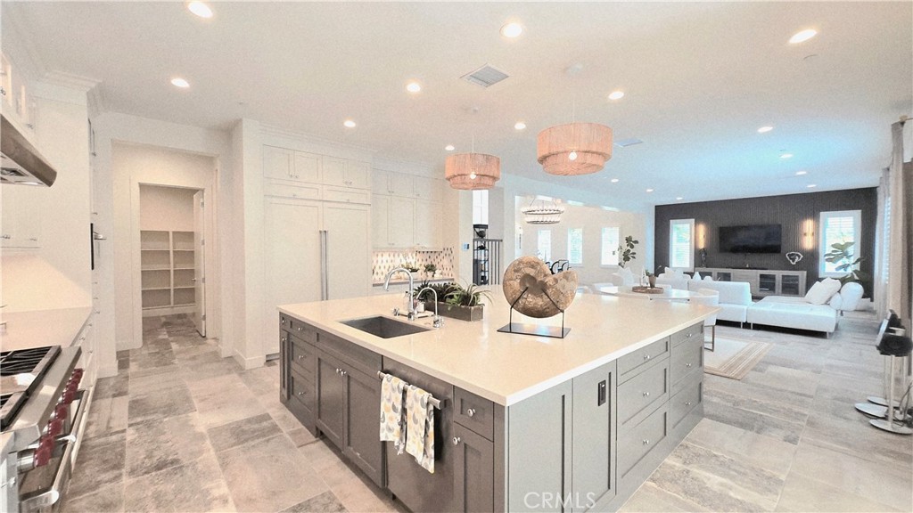 56 Redshift Irvine, CA 92618 - Photo 25 of 67 a kitchen with sink stove and refrigerator