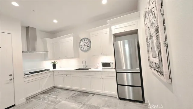 a spacious bathroom with a double vanity sink and a mirror