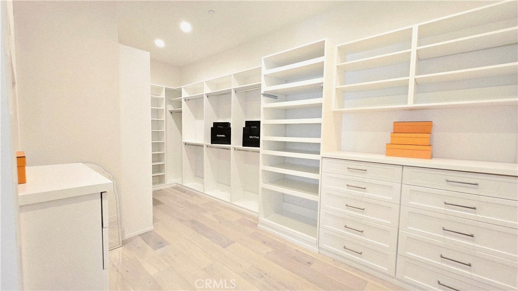 56 Redshift Irvine, CA 92618 - Photo 35 of 67 a view of a walk in closet