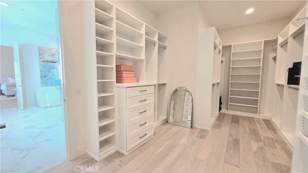 56 Redshift Irvine, CA 92618 - Photo 36 of 67 a view of closet area with empty racks