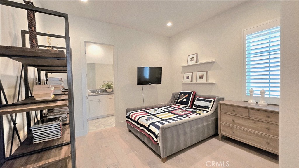 56 Redshift Irvine, CA 92618 - Photo 39 of 67 a bedroom with a bed next to a window