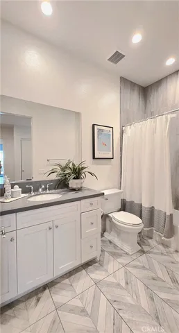 a view of a swimming pool with chairs