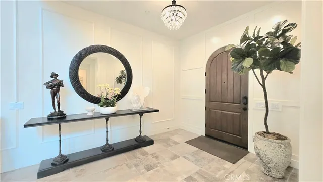 a view of a dining room and chandelier