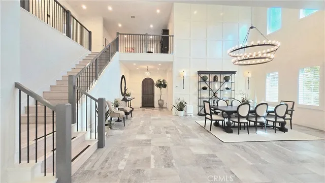 a view of a kitchen and dining room