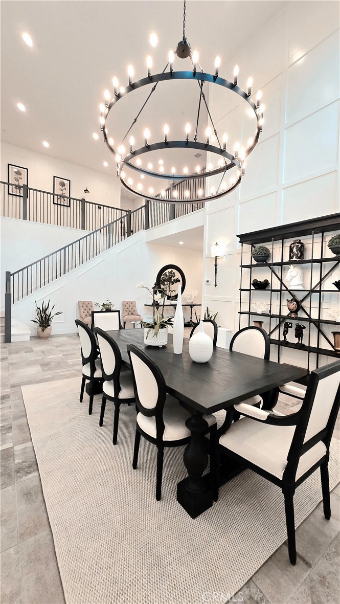 56 Redshift Irvine, CA 92618 - Photo 9 of 67 a view of a dining room and chandelier