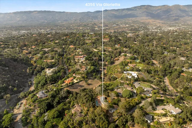 a view of a city with mountain