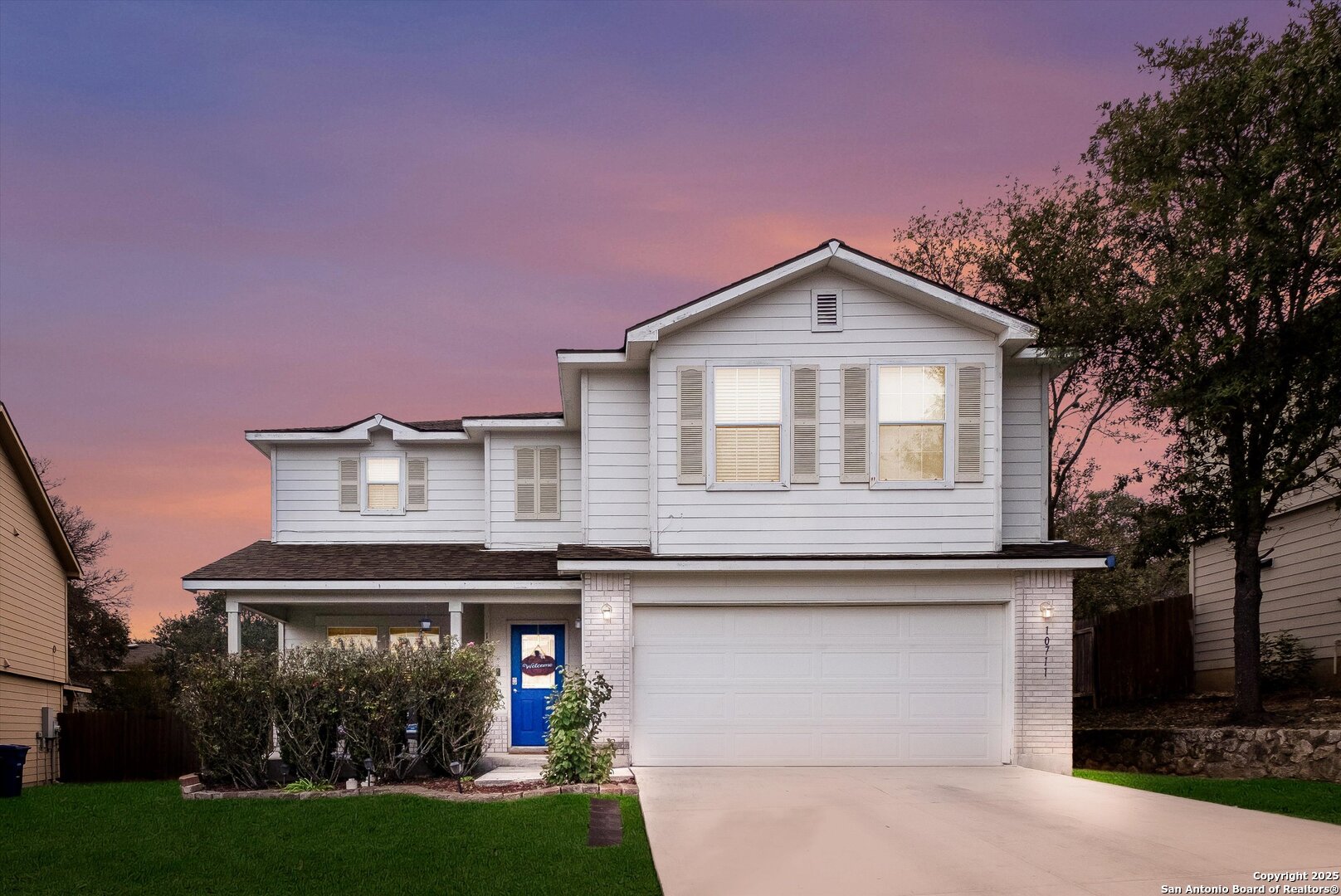 10711 Rindle Ranch San Antonio, TX 78249 - Photo 2 of 31 a front view of a house with yard