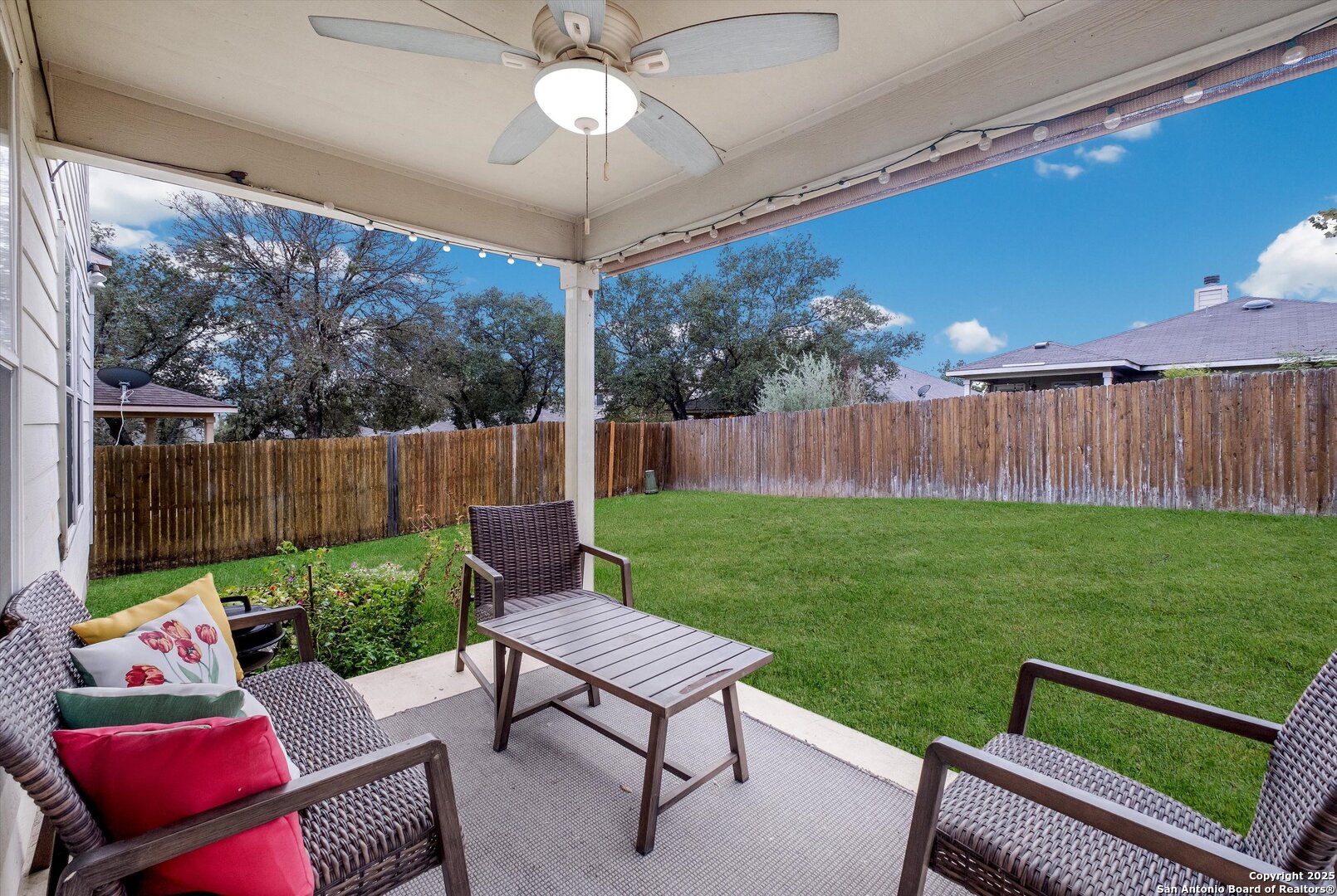 10711 Rindle Ranch San Antonio, TX 78249 - Photo 26 of 31 a view of a patio with a yard