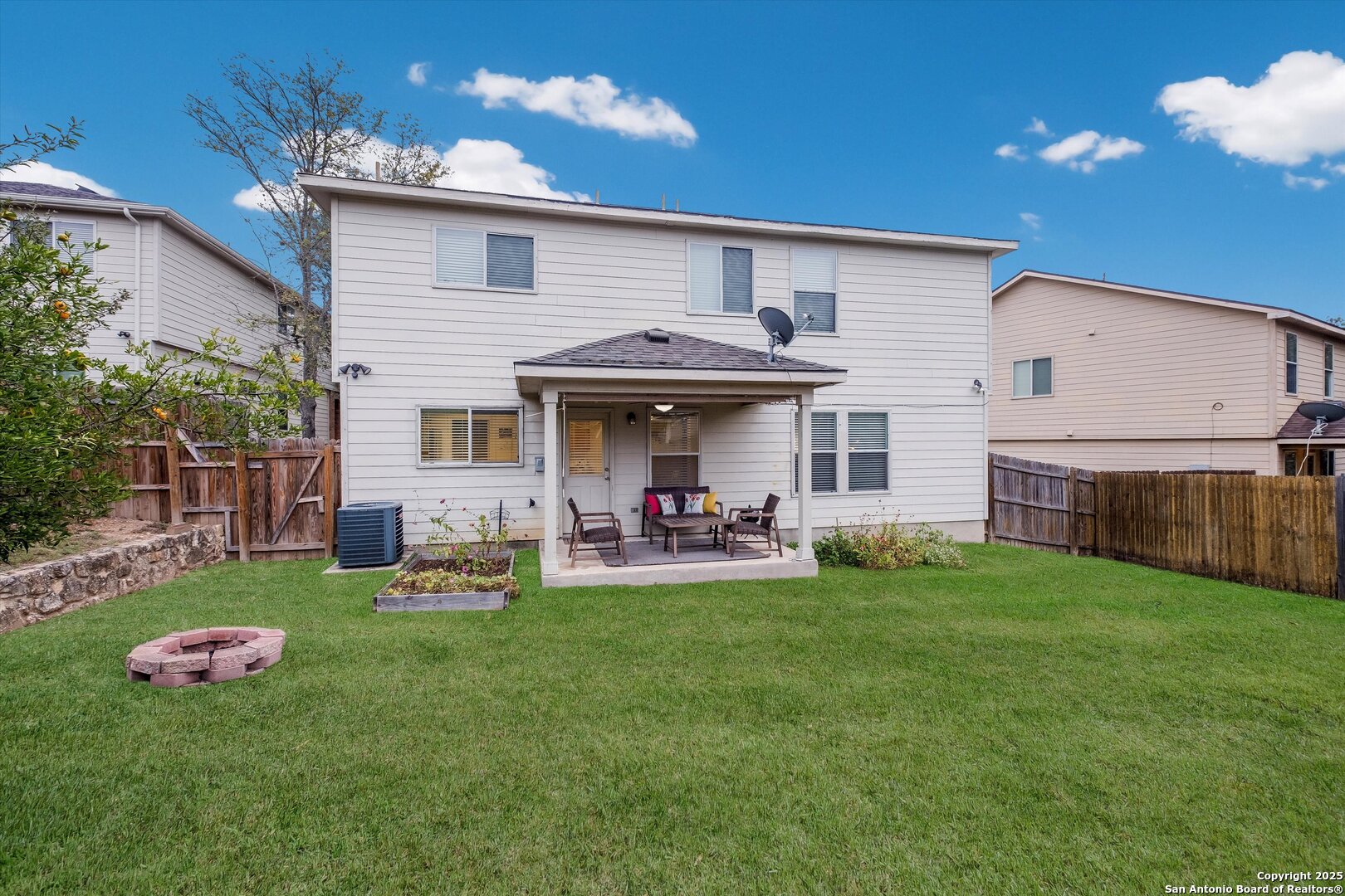 10711 Rindle Ranch San Antonio, TX 78249 - Photo 27 of 31 a view of a house with backyard porch and sitting area