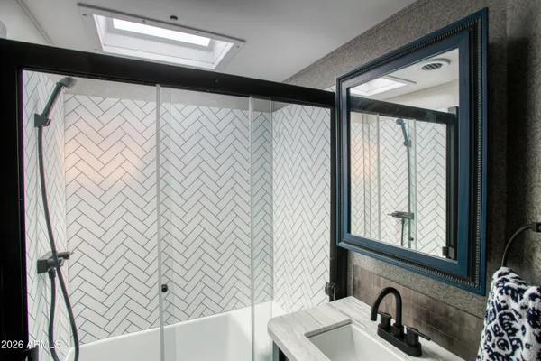 a view of a kitchen with a sink