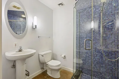 a front view of a building with a street