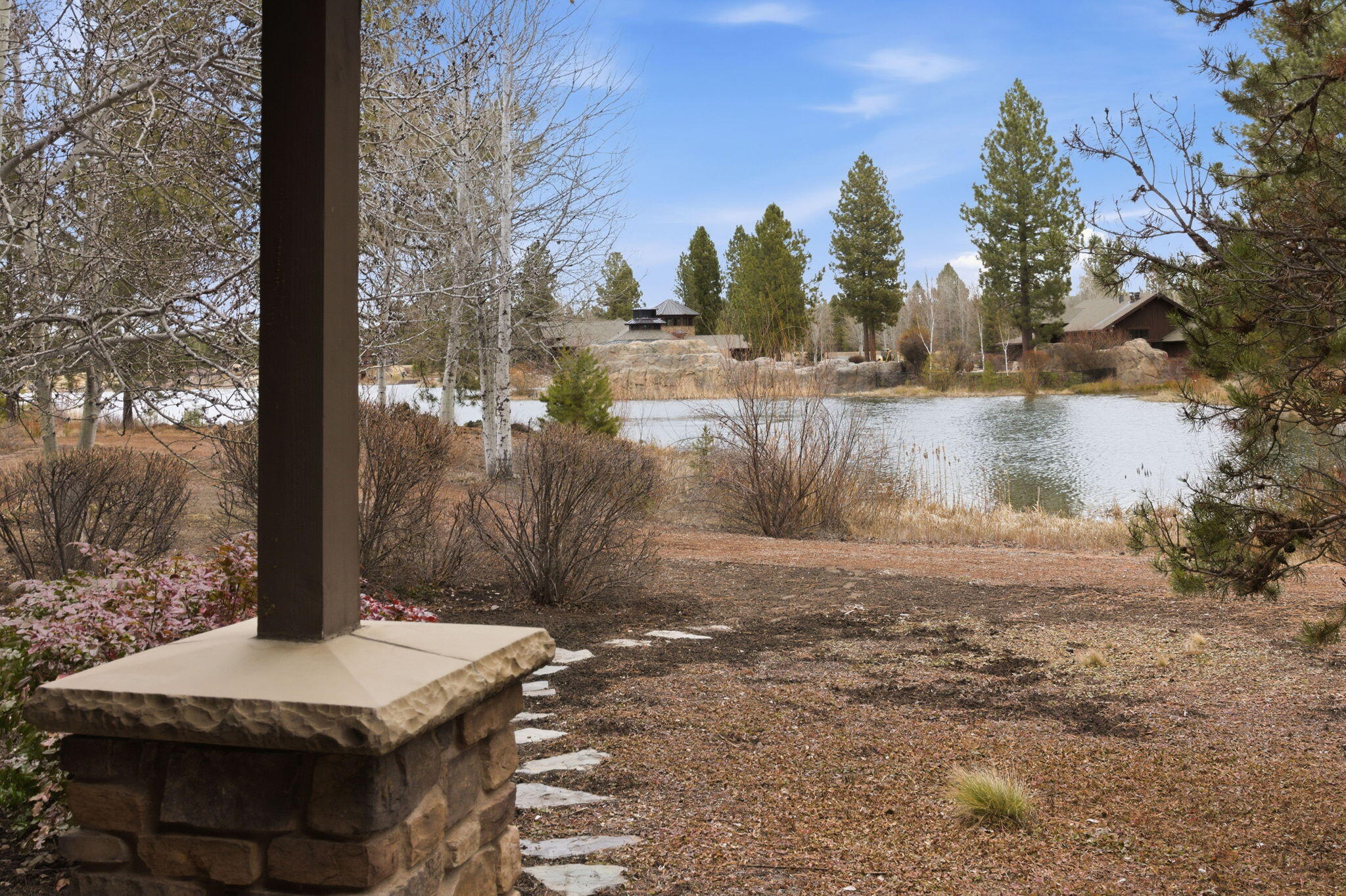 56508 Dancing Rock Loop, Unit 22 Bend, OR 97707 - Photo 43 of 69 a view of a yard with trees