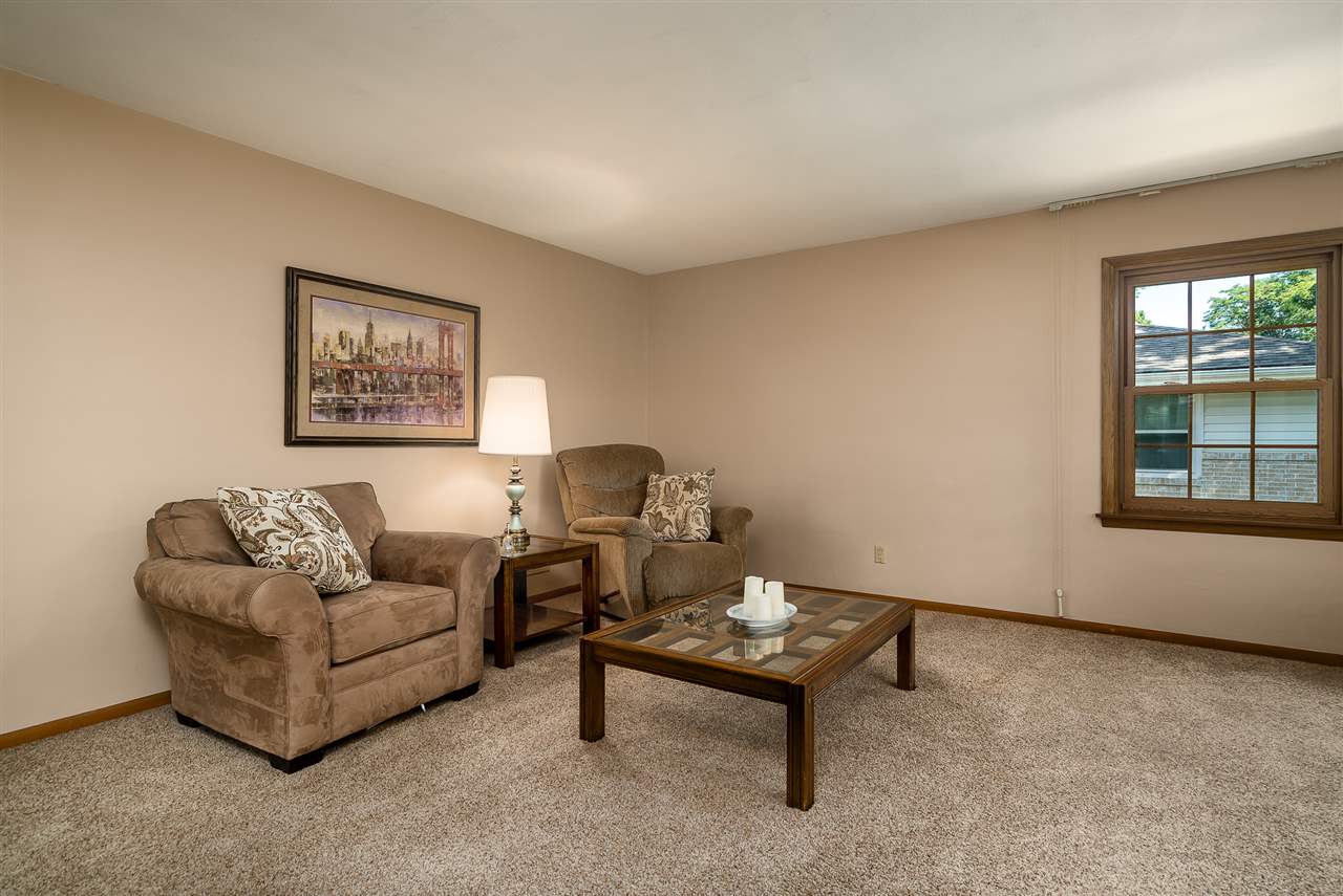 1104 Brookfield Road Rockford, IL 61107 - Photo 2 of 22 a living room with furniture and a window