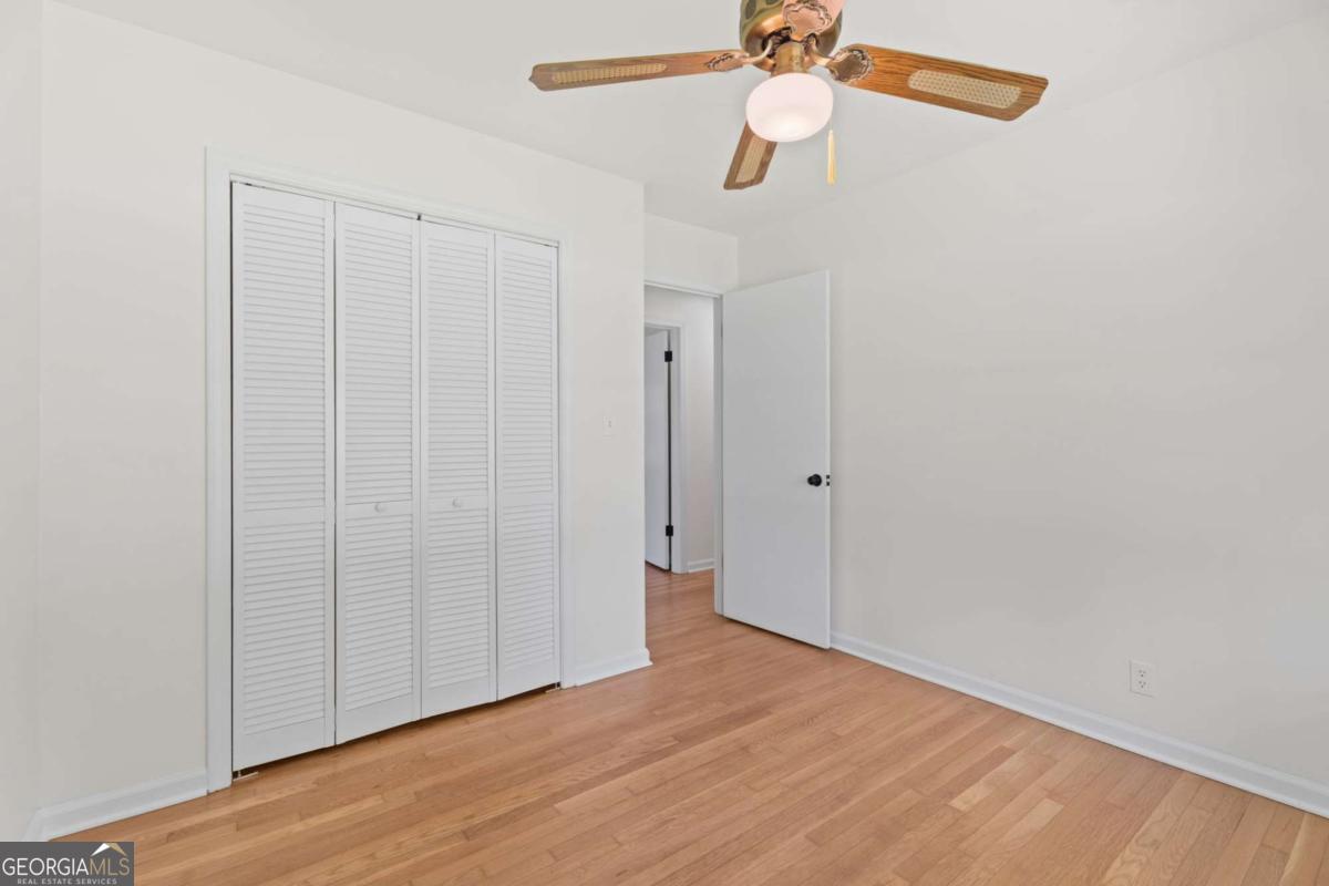 865 Old Tucker Road Stone Mountain, GA 30087 - Photo 27 of 57 a view of a room with wooden floor