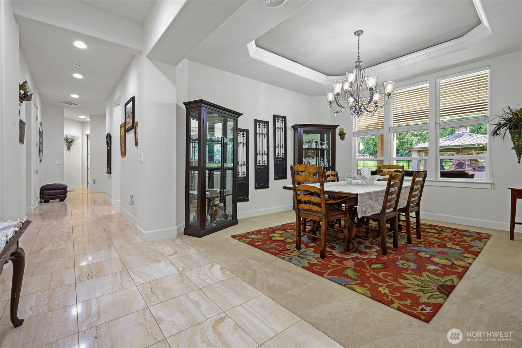 13612 231st Street East Graham, WA 98338 - Photo 12 of 40 a view of a dining room with furniture window and chandelier