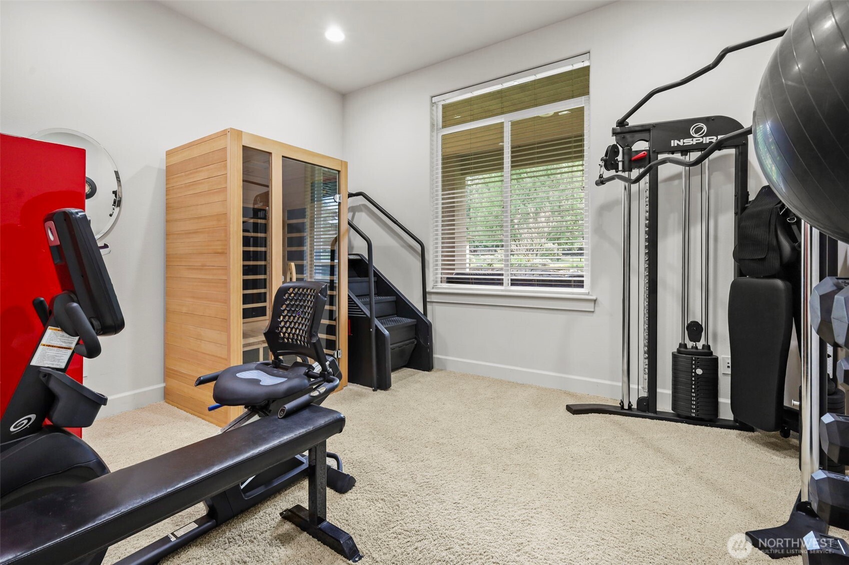 13612 231st Street East Graham, WA 98338 - Photo 14 of 40 a view of a workspace with furniture and a window