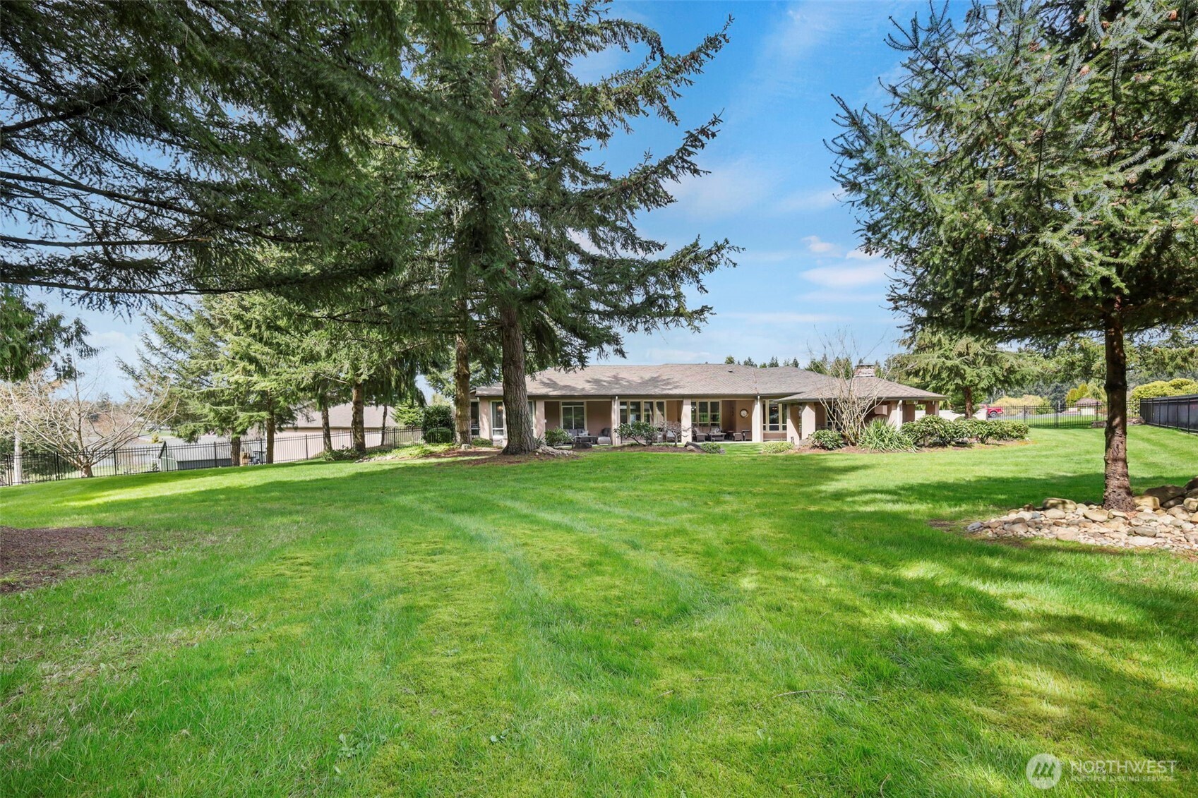 13612 231st Street East Graham, WA 98338 - Photo 23 of 40 front view of a house with a garden