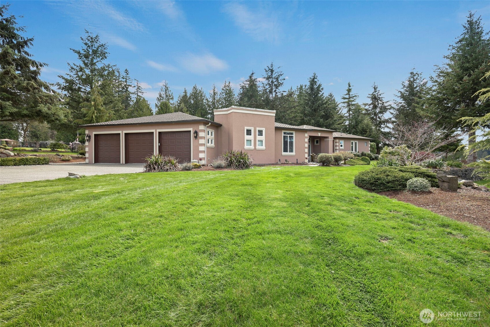 13612 231st Street East Graham, WA 98338 - Photo 27 of 40 a view of a house with a yard and sitting area