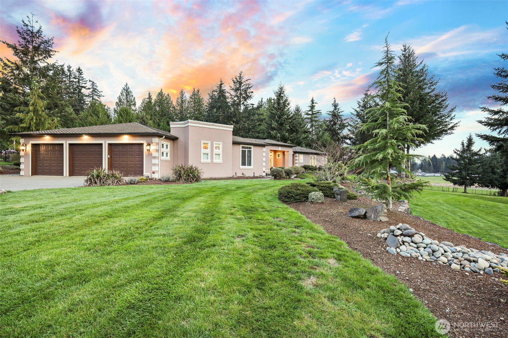 13612 231st Street East Graham, WA 98338 - Photo 37 of 40 a view of a house with backyard and trees