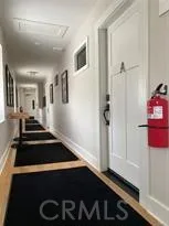 a view of a hallway with closet