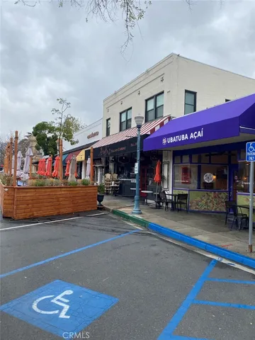 a view of a building with sitting area