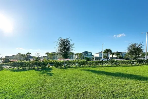 a view of a golf course with a lake