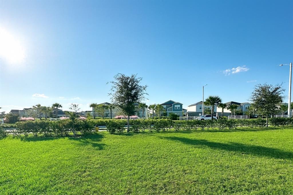 1122 Brimstone Circle Winter Haven, FL 33884 - Photo 15 of 17 a view of a golf course with a lake